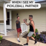 Dou pickleball players greeting each other