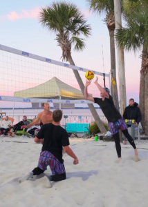 Volleyball players volleying